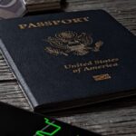 a passport sitting on top of a wooden table